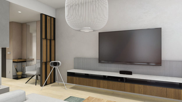 Trendový návrh obývačky delí od predsiene paraván z ocele a dubového masívu. Minimalistickú TV stenu dopĺňa plstená zástena.