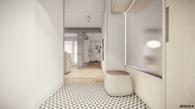 Návrh predsiene s marockou dlažbou a minimalistickým masívnym nábytkom so zrkadlovou stenou.