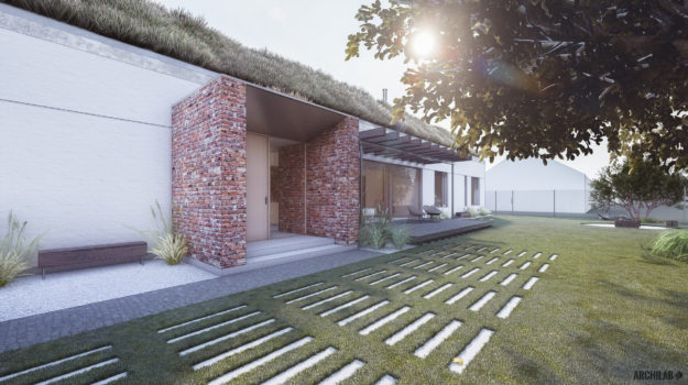 Návrh domu s tehlovým vstupným portálom, čistými líniami a vegetatívnou strechou.