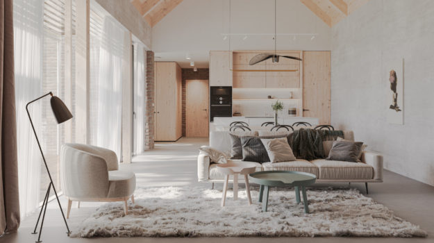 Interiér domu s priznanými tehlami a svetlými materiálmi. Škandinávsky dizajn obývacieho priestoru prepojený s jedálňou a kuchyňou.